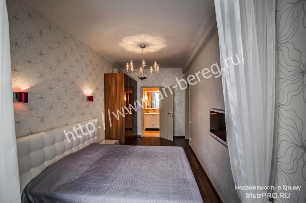 Продается квартира в новом доме в центре Ялты по улице Щорса. Общая площадь 107 кв.м., располагается на 7 этаже в 14... - 8