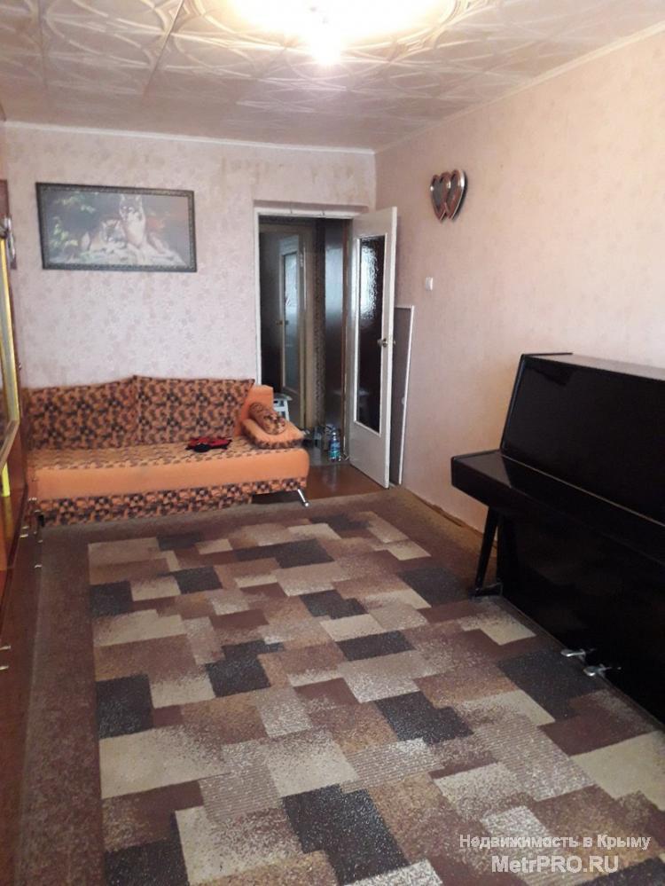 Продается двухкомнатная квартира в Крыму в городе Феодосия. Район рынка «Полтавский». Квартира расположена на втором... - 1